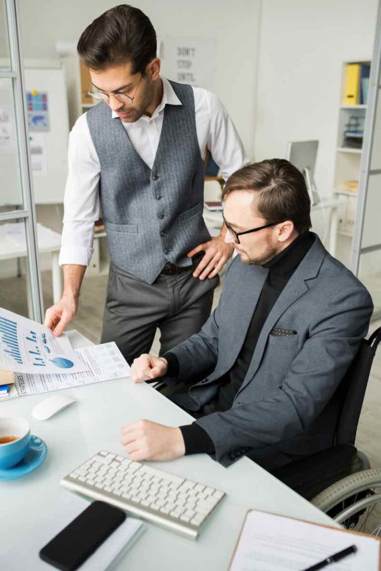 business-people-examining-business-graphs-EYB89TR